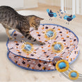 Load image into Gallery viewer, A playful tabby cat interacts with a colorful, patterned cat toy featuring moving balls, with whimsical bird illustrations above.