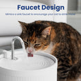 Load image into Gallery viewer, A calico cat drinks from a modern ceramic cat water fountain designed to resemble a faucet, promoting hydration through flowing water.