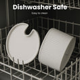 Load image into Gallery viewer, Two white attachments of PawsPik Ceramic Cat Fountain in a dishwasher, showcasing their dishwasher-safe quality and easy-to-clean design.