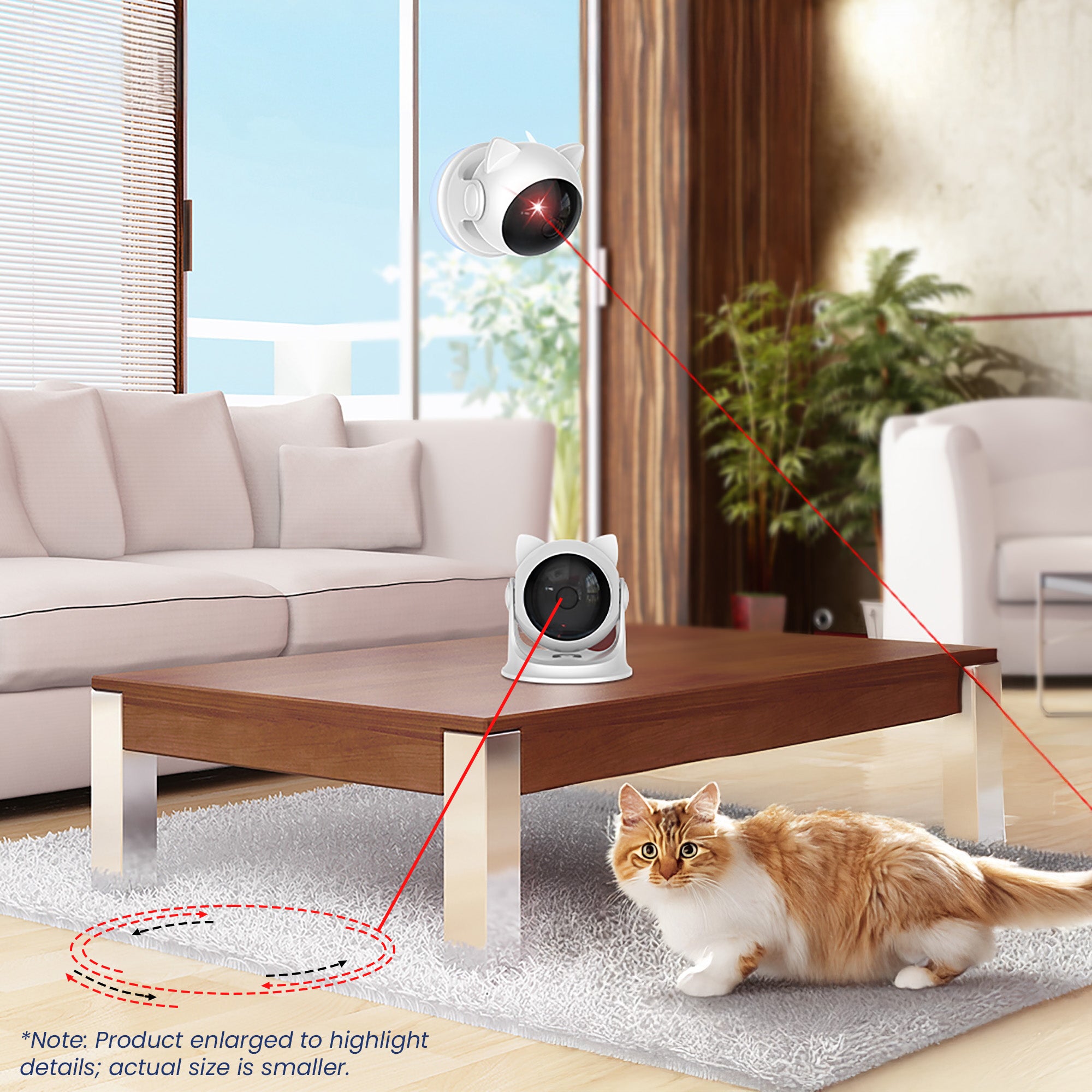 A playful cat watches a laser pointer from a cat toy on a coffee table in a modern living room.