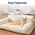 Load image into Gallery viewer, A cozy cat resting on an ultra-soft fleece cat couch, showcasing features: plush cotton filling, and an anti-slip base for safety.