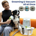 Load image into Gallery viewer, Person with PawsPik dog grooming kit next to a dog using pet vacuum cleaner with text "Grooming & Vacuum All at Once" above.