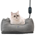 Load image into Gallery viewer, Fluffy cat sitting in an ash-grey PawsPik heated pet bed with a digital temperature controller hanging beside it.