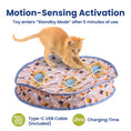 Load image into Gallery viewer, An orange tabby cat plays on a colorful motion-sensing automatic cat toy by PawsPik that enters standby mode after 5 minutes of use. 
