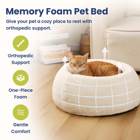 A cozy memory foam cat bed with an orange cat resting comfortably inside, featuring orthopedic support and gentle comfort.