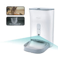 Load image into Gallery viewer, A modern automatic cat food dispenser with a camera, showing a cat eating kibble in the top left in daylight and in night vision below.
